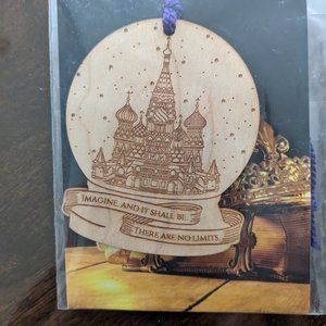 The Crown's Game wooden ornament